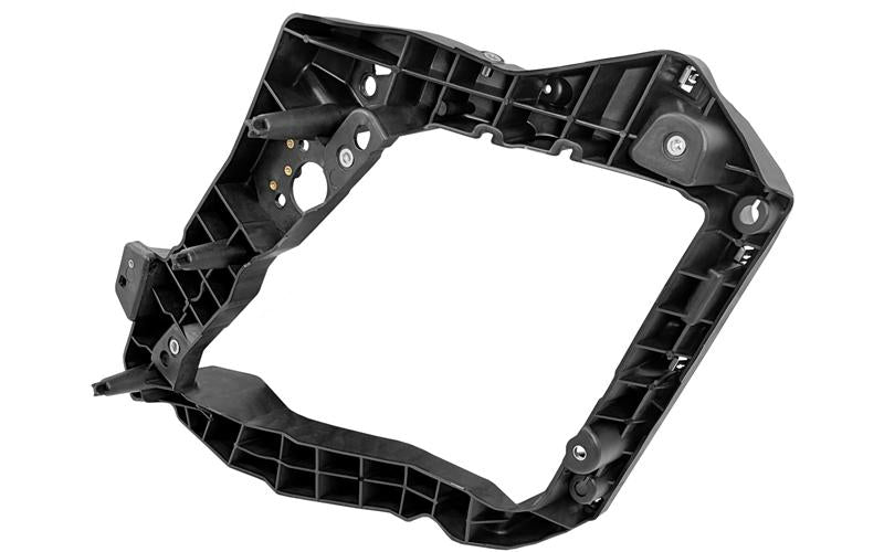 Volvo FM5/FMX - Strålkastarfäste vänster